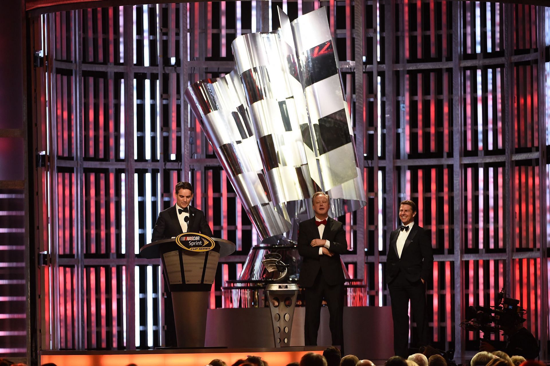 Jeff Gordon (far left) and Tom Cruise (far right) during the 2015 NASCAR Awards Banquet - Source: Getty